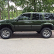 Illustration for article titled At $8,200, Is It High Time Someone Buy This Lifted 1995 Jeep Grand Cherokee?